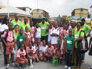 Nollywood Stars and Good Living Initiative Members group pictures with Students and Teachers